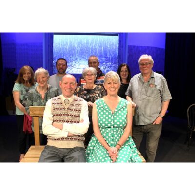The cast and production team for September in the Rain